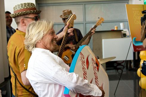 Richard Branson with the band at San Francisco airport